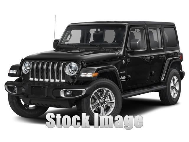 2023 Jeep Wrangler Sahara in Silver Zynith Cle — front three-quarter view