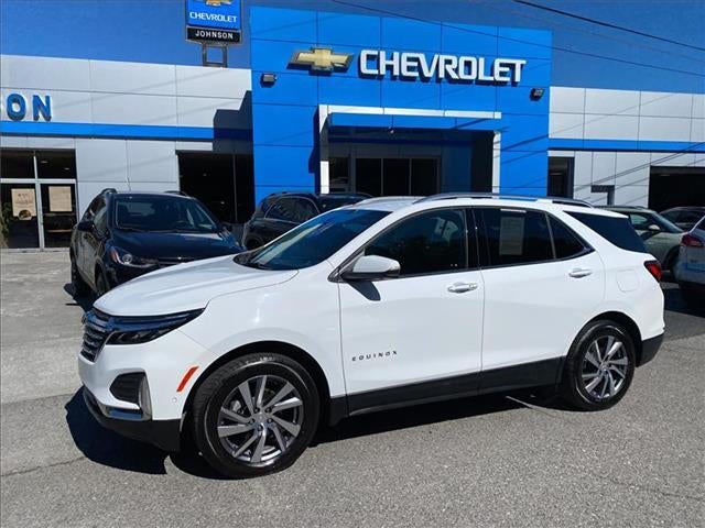 2023 Chevrolet Equinox Premier in Summit White — front three-quarter view